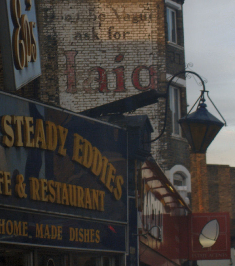 ghost sign of Haig Whisky